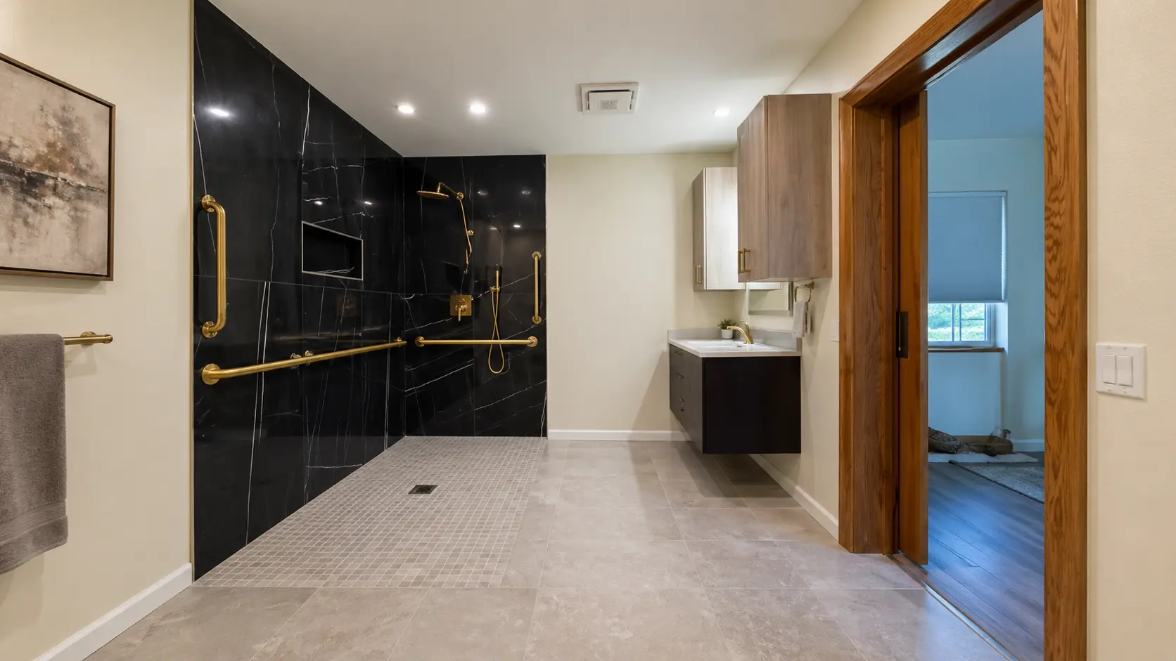 Bathroom remodel — black marble shower with floating vanity